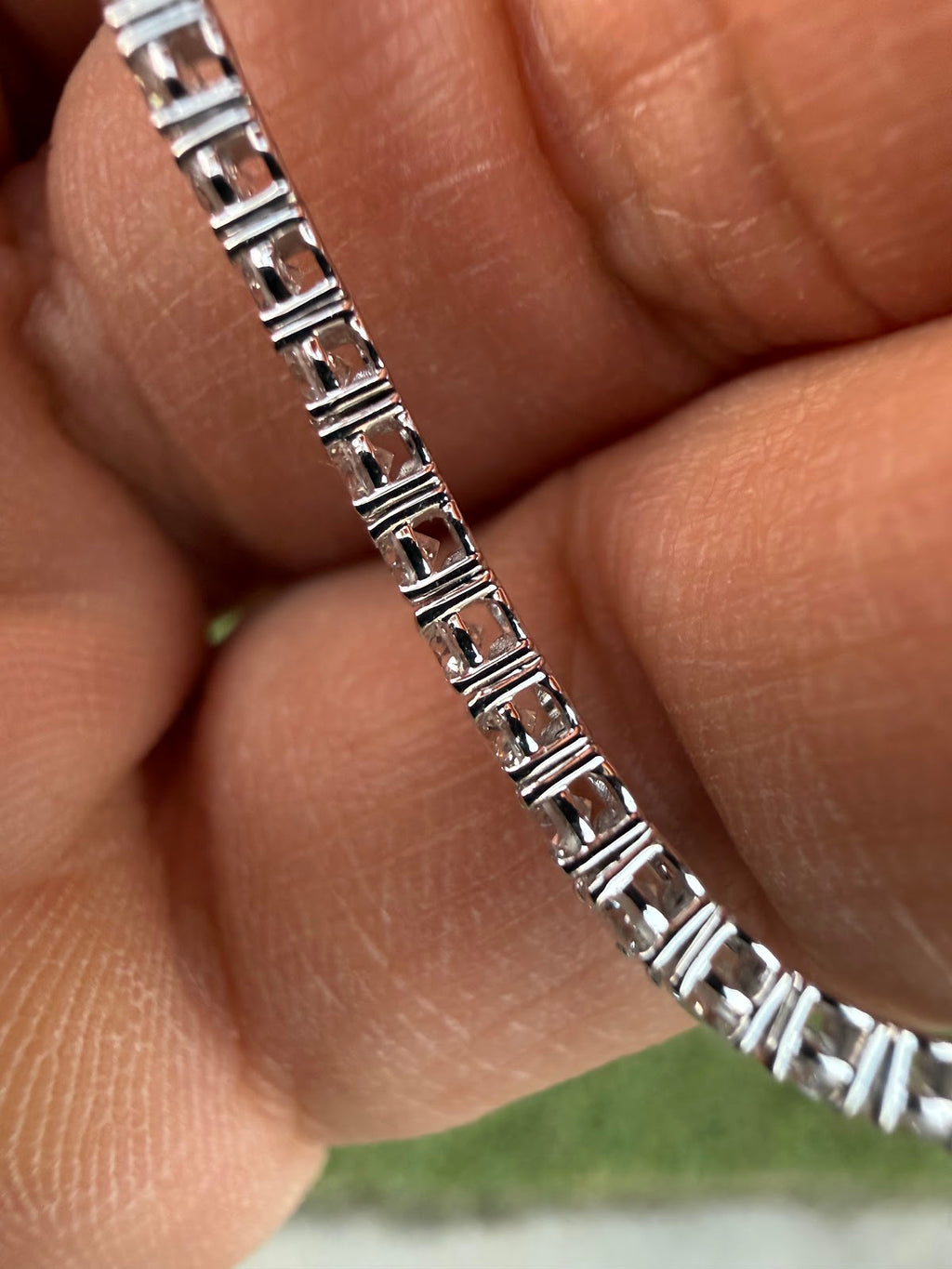 Underside of the 14K white gold tennis bracelet showing link construction