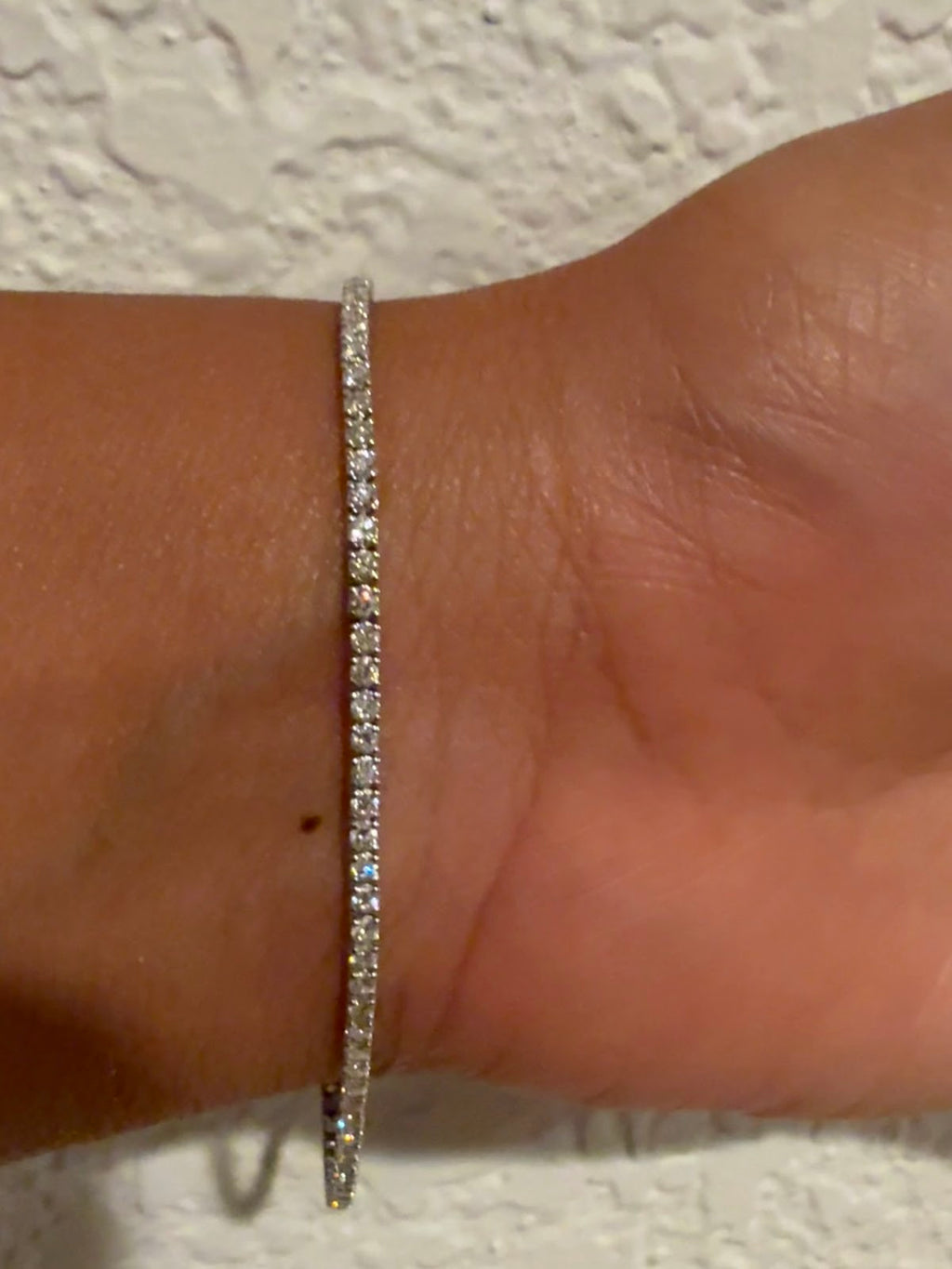 3 carat tennis bracelet on the wrist, full 7 inch length