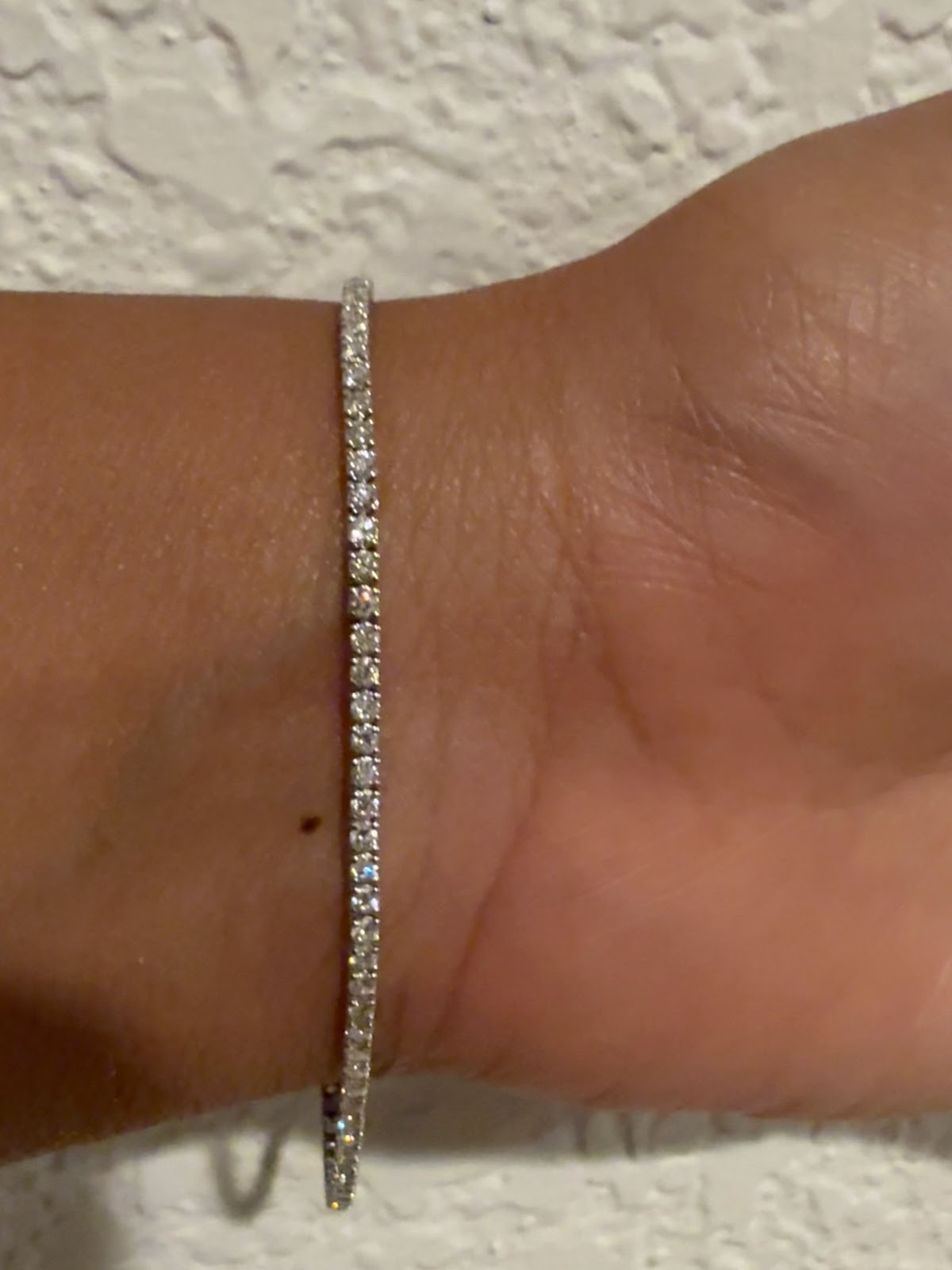 3 carat tennis bracelet on the wrist, full 7 inch length