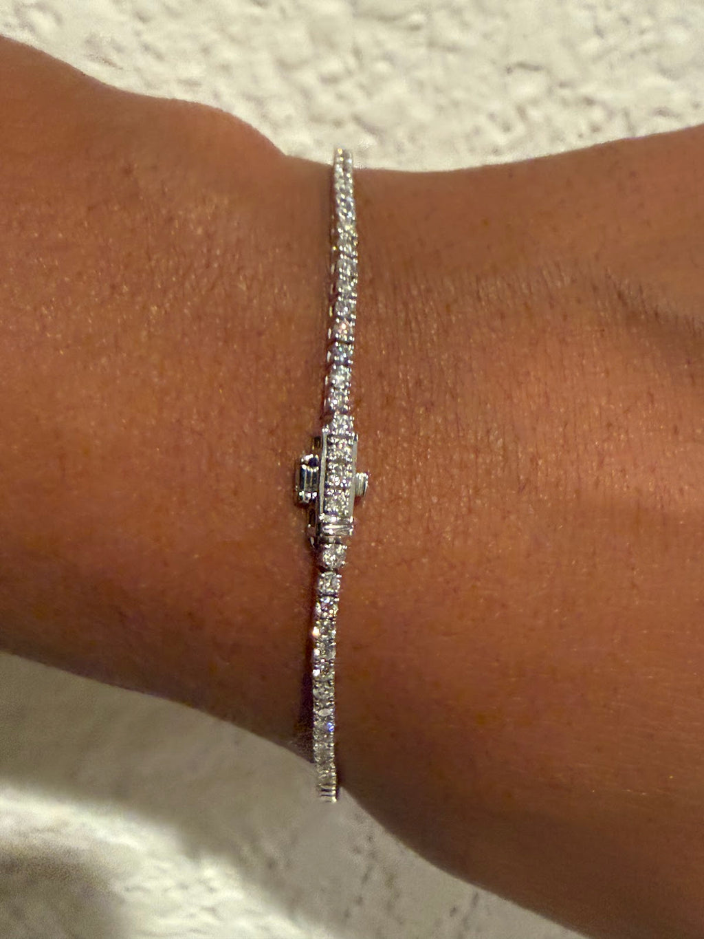 3 carat lab diamond tennis bracelet showing box clasp and safety latch on the wrist