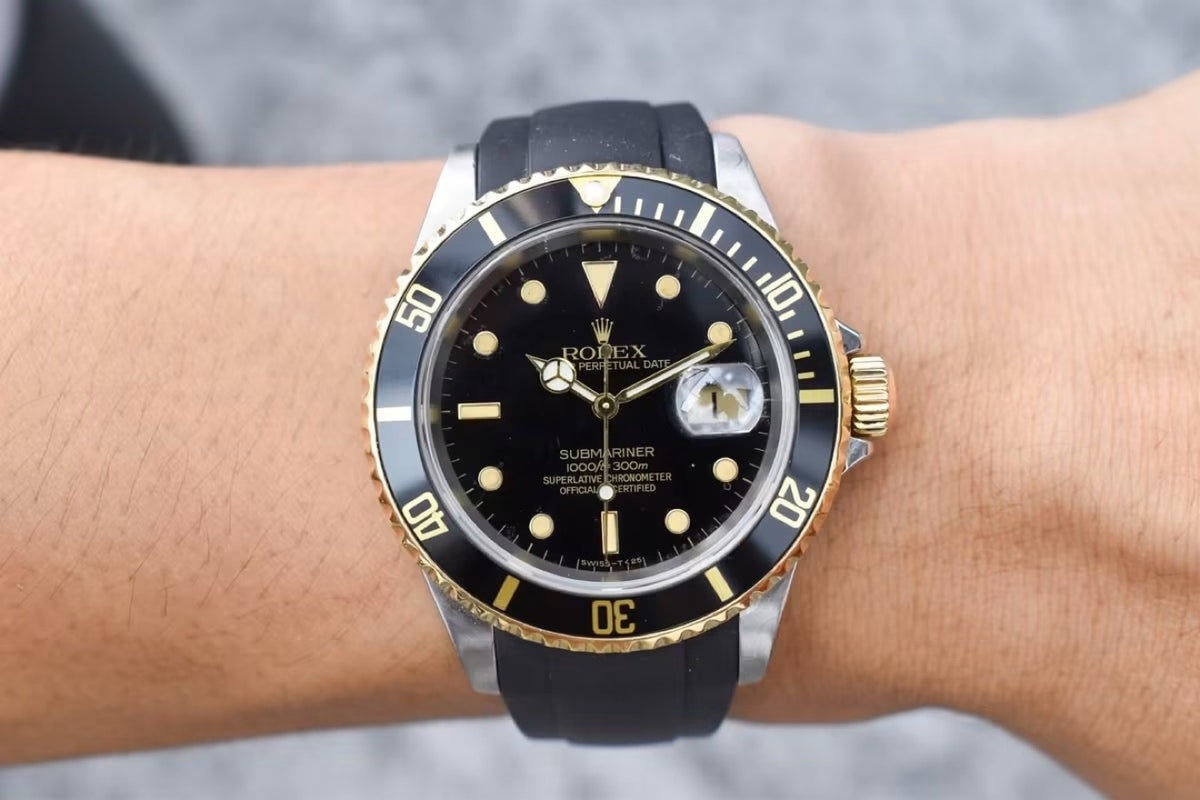 Rolex Submariner 16613 two-tone steel and yellow gold, worn on rubber strap