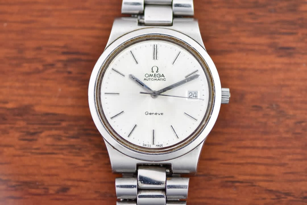 Omega Genève Automatic Ref. 166.0173, silver dial with date, cushion steel case on bracelet