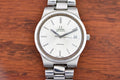 Omega Genève Automatic Ref. 166.0173, silver dial with date, cushion steel case on bracelet